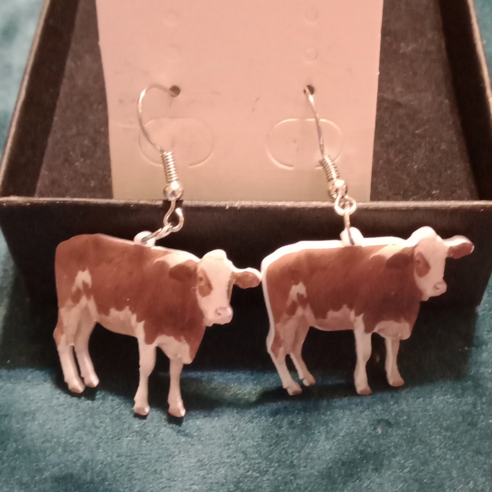 Pair Of Cow Earrings